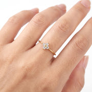 Hand wearing Lelice gold crystal clover ring Mathilde
