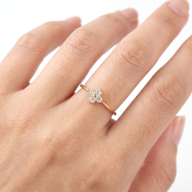 Hand wearing Lelice gold crystal clover ring Mathilde