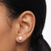 Close-up of the Lelice Matilda Pearl Earrings in silver on the ear