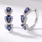 Lelice Midnight Sapphire Hoops in silver on a white background