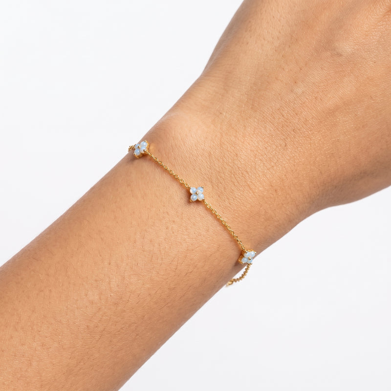 Close-up of the Lelice Mina Clover Bracelet in gold on the wrist