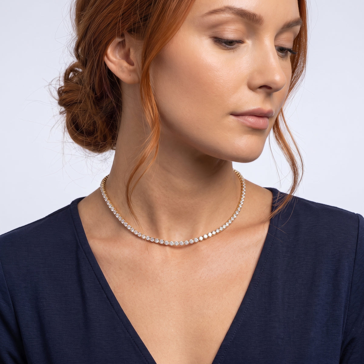 Neckline profile with hair up, wearing the Monaco Tennis Choker