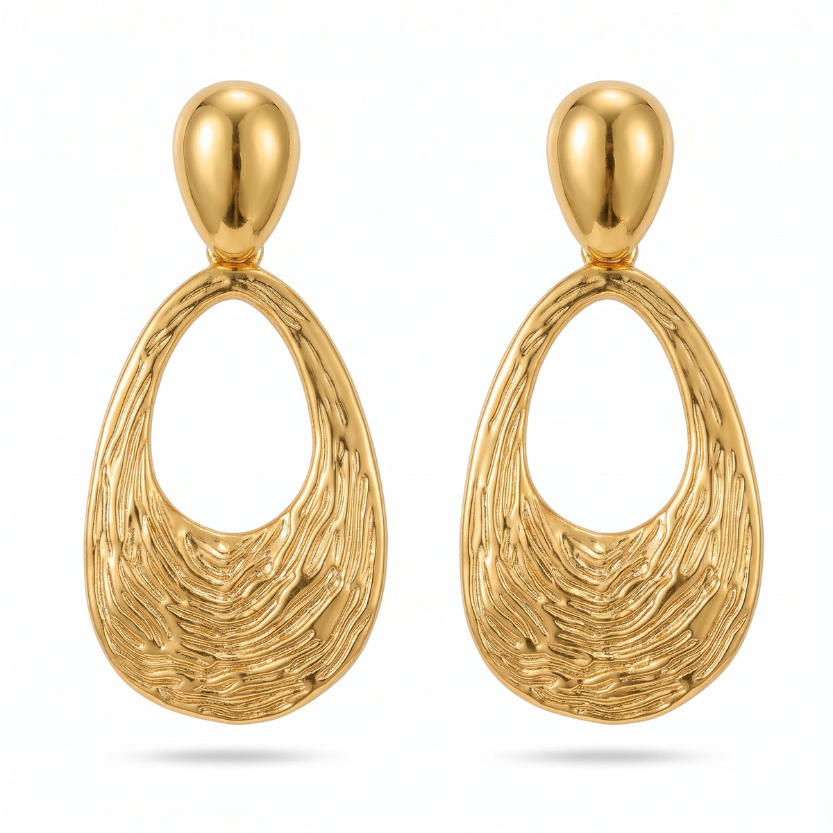 Lelice Nadia Gold Textured Teardrop Statement Earrings on a white background