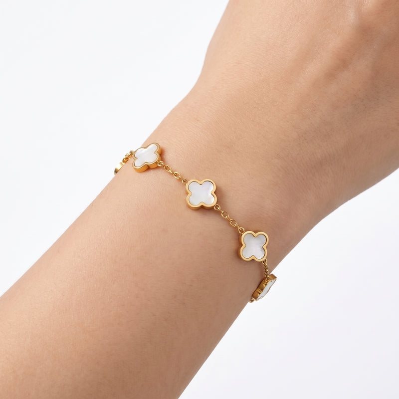 Close-up of the Lelice Noa Charm Bracelet in gold on the wrist