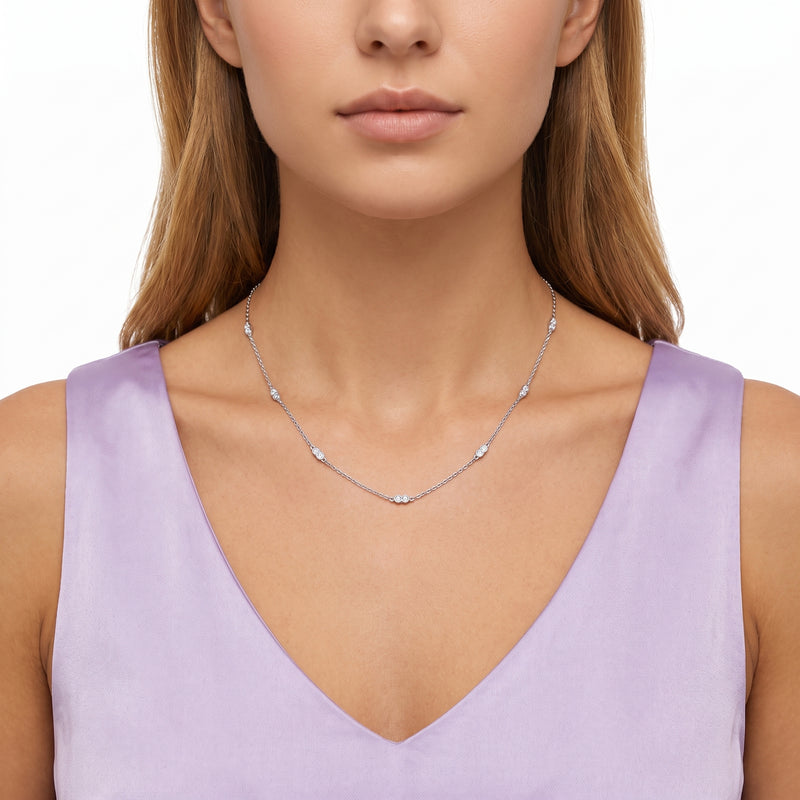 Close-up of the Lelice Nora Zircon Necklace in silver at the collarbone