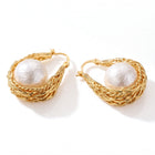 Lelice Pearl Nest Hoops in gold on a white background