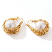Lelice Pearl Nest Hoops in gold on a white background