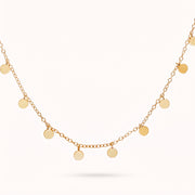 Lelice Penny Charm Necklace in gold on a white background