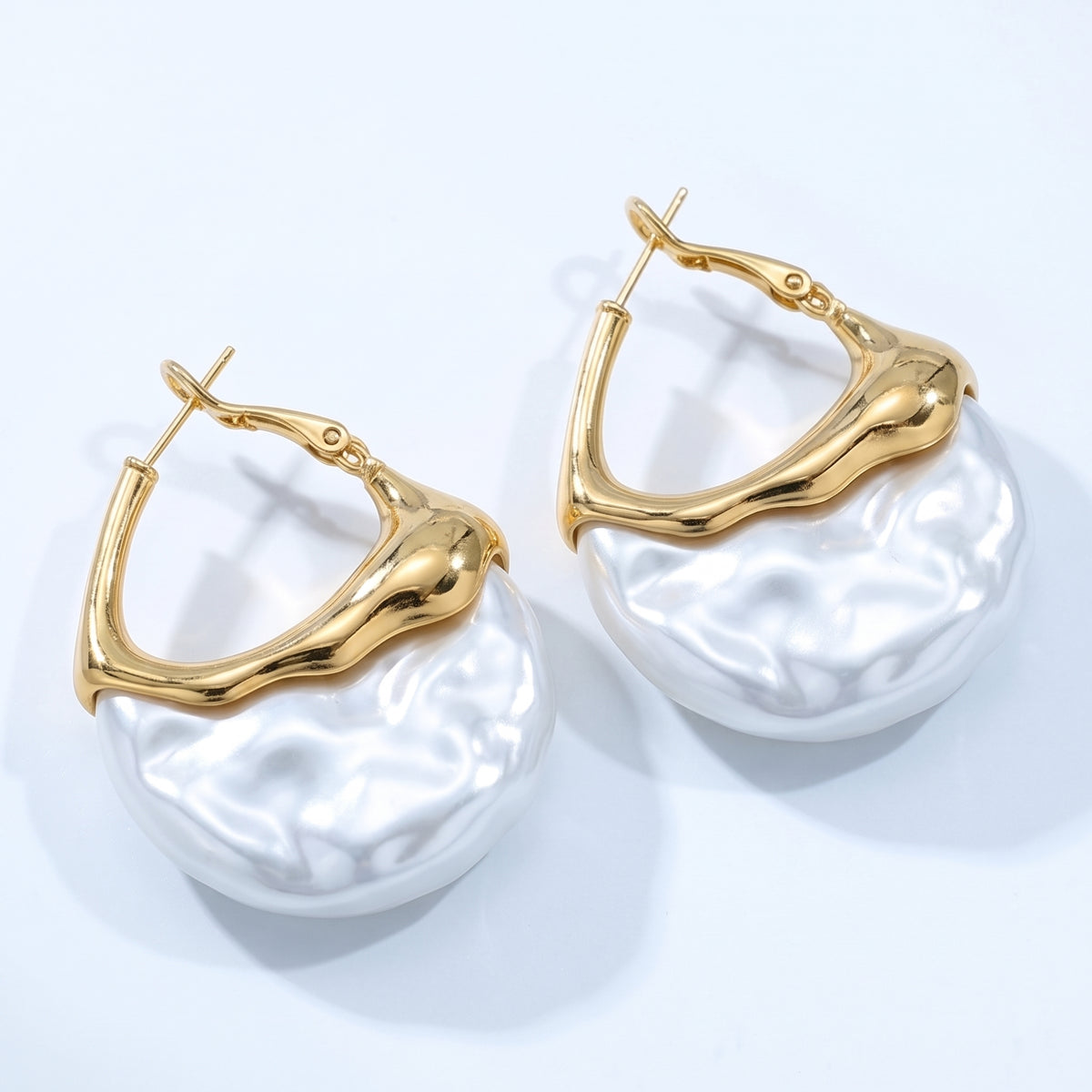 Lelice Perla Gold Baroque Pearl Chunky Hoop Earrings on a white background