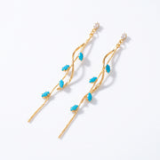 Lelice Santorini Turquoise Drops in gold on a white background