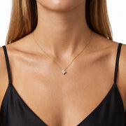 Woman wearing Lelice gold clover pendant necklace Scarlett