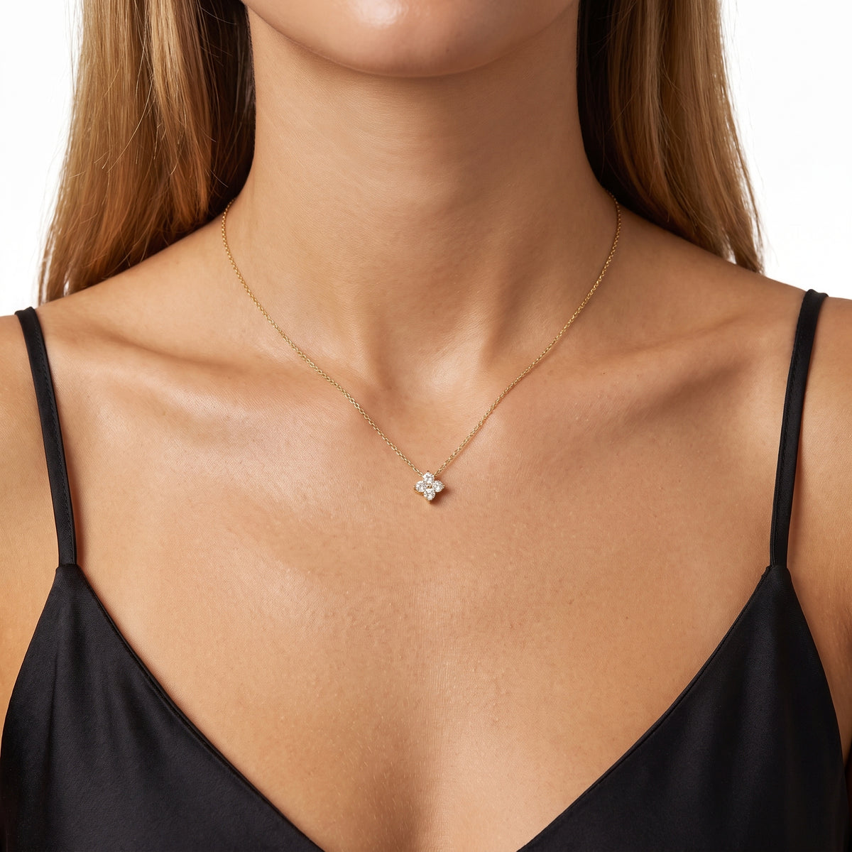 Woman wearing Lelice gold clover pendant necklace Scarlett