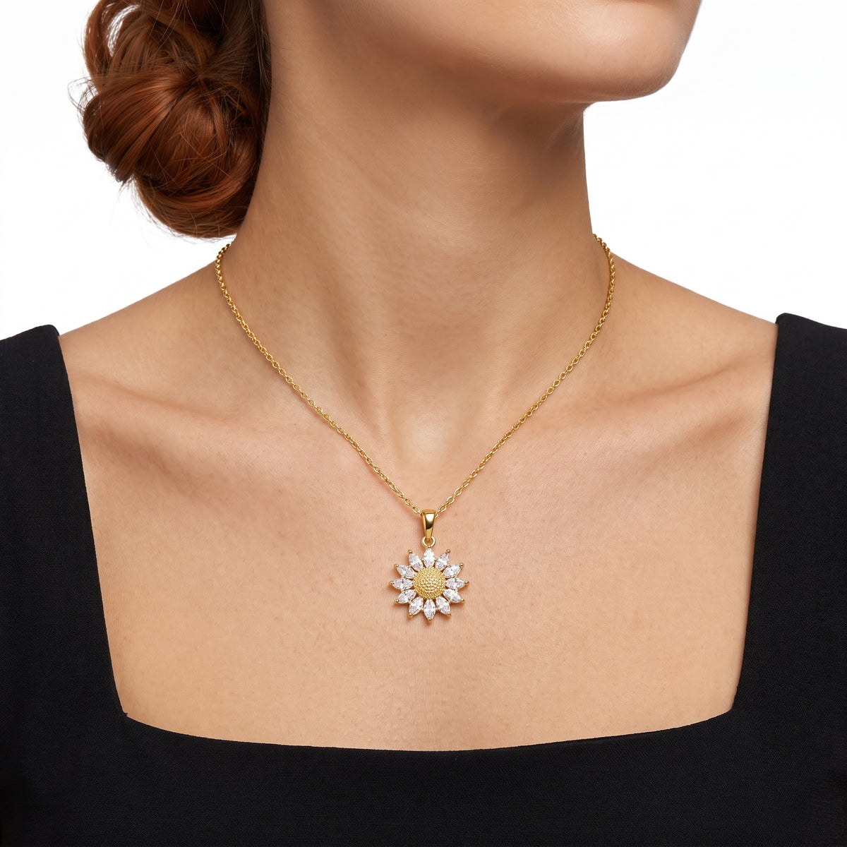 Close-up of the Lelice Soleil Gold Sunflower Pendant Necklace at the collarbone