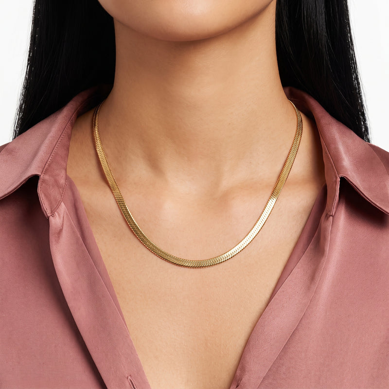 Close-up of the Lelice Solène Gold Necklace at the collarbone