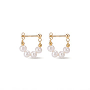 Lelice Sophie Pearl Hoops in gold on a white background