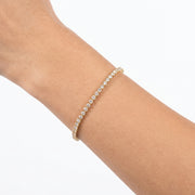 Close-up of the Lelice Sophie Tennis Bracelet in gold on the wrist