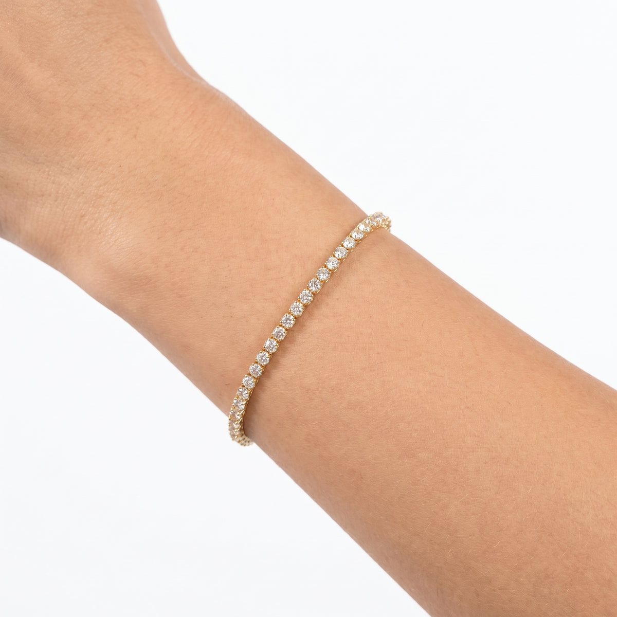 Close-up of the Lelice Sophie Tennis Bracelet in gold on the wrist