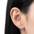 Close-up of the Lelice Sparkle Silver Hoops on the ear