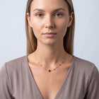 Portrait of a woman wearing the Stardust Choker