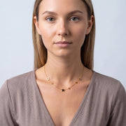 Portrait of a woman wearing the Stardust Choker