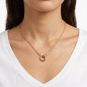 Close-up of the Lelice Thea Circles Necklace in gold at the collarbone