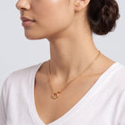 Side profile of the neckline with the Thea Circles Necklace