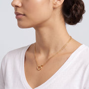 Side profile of the neckline with the Thea Circles Necklace