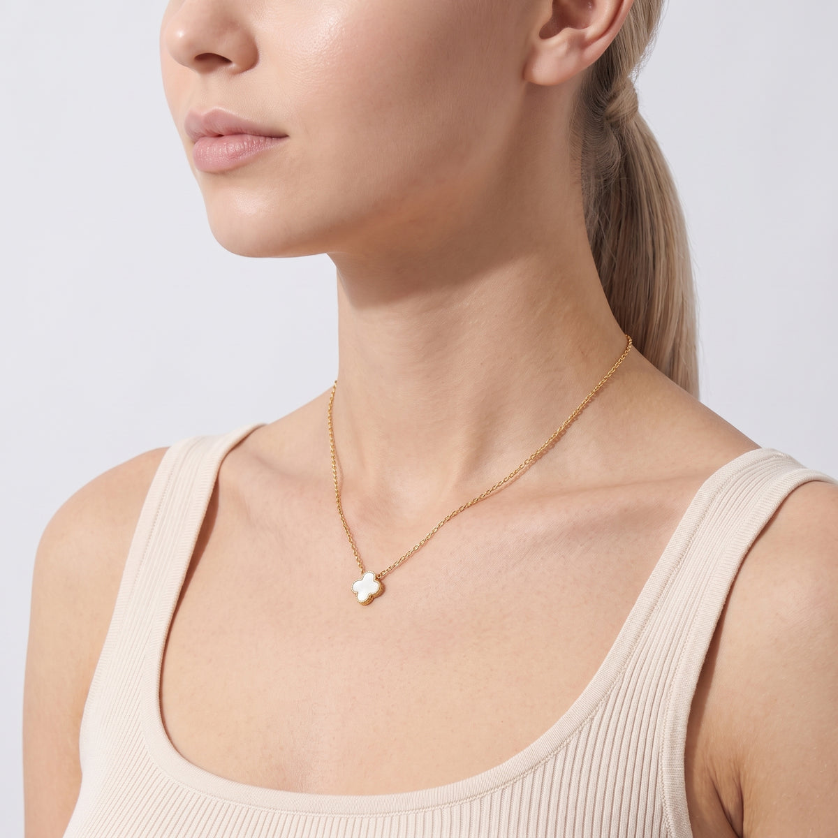Side profile of the neckline with the Verona Clover Pendant