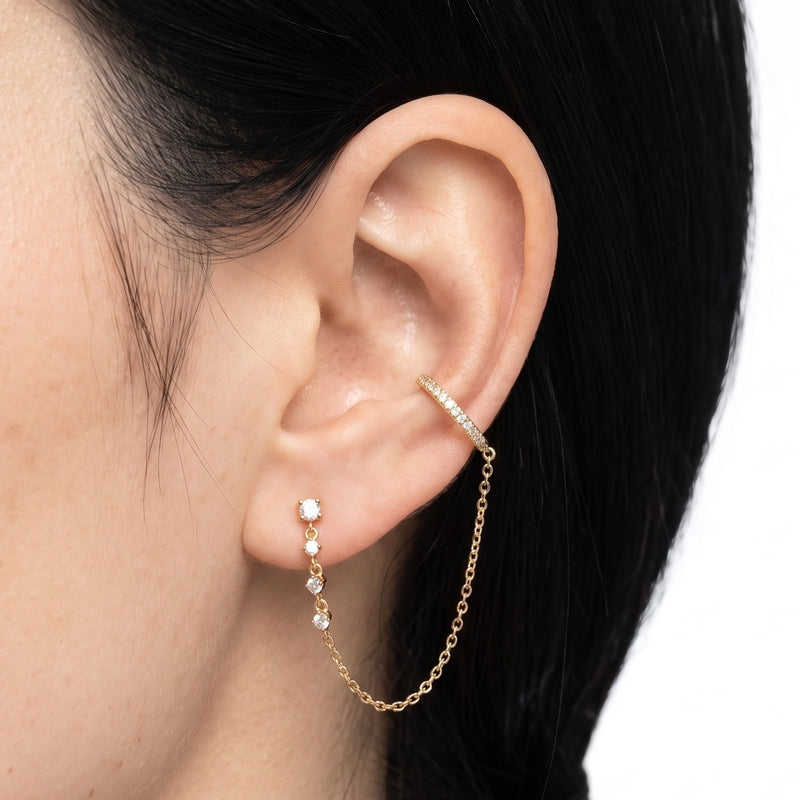 Close-up of the Lelice Victoire Chain Earrings in gold on the ear