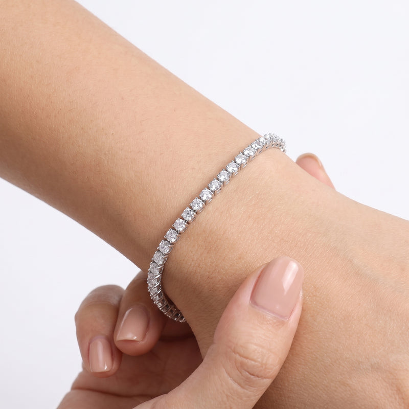 Wrist wearing Lelice silver crystal tennis bracelet Victoria