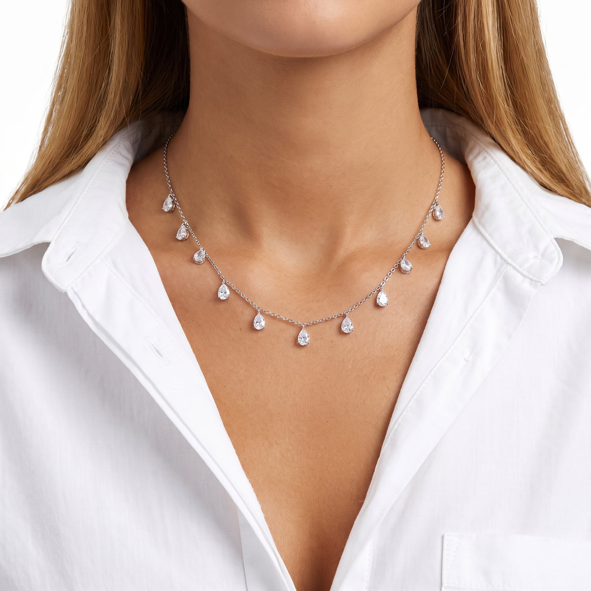 Close-up of the Lelice Vivienne Drop Necklace in silver at the collarbone