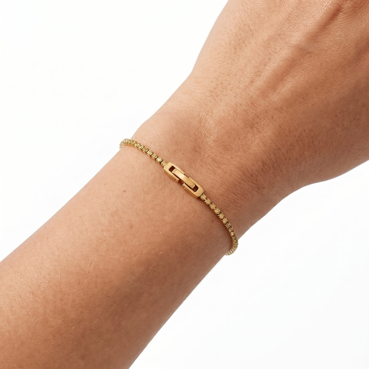 Close-up of the Lelice Zoé Peridot Bracelet in gold on the wrist