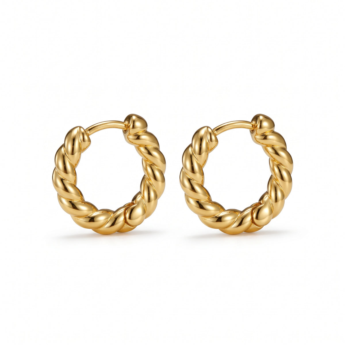 Lelice Zoe Spiral Earrings in gold on a white background